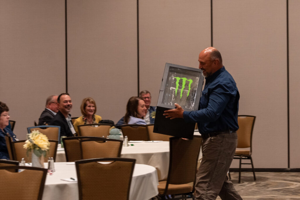 Mackinaw Administrators - Sam SanMiguel - Carrying Monster Fridge